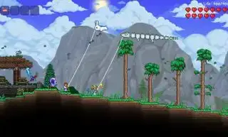 Terraria: due giocatori fanno volare gli aquiloni uno accanto all'altro.