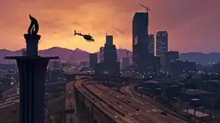 GTA 5 trikovi — Helikopter u letu iznad Los Santosa dok zalazi sunce