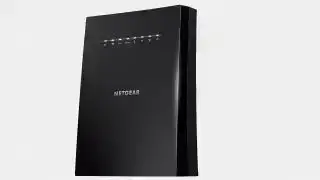 Imej Netgear Nighthawk X6S pada latar belakang kelabu.