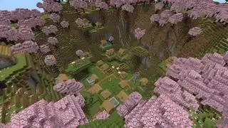 Llavors de Minecraft: un poble en una vall envoltada de cirerers en flor