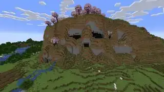 Minecraft விதைகள் - ஒரு பயமுறுத்தும் மண்டை ஓடு மலை செர்ரி ப்ளாசம் காடு தொப்பியுடன் கவாய் செல்கிறது