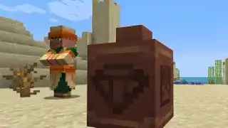 Minecraft 1.20 - en landsbyboer i ørkenen står bag en lerkrukke med et mønster på den