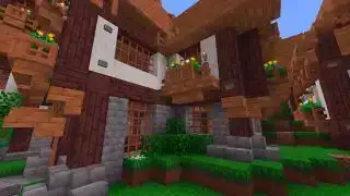 我的世界 (Minecraft) 材质包 - 啄木鸟 - 一个小村庄的景色，有卡通、明亮的彩色方块。