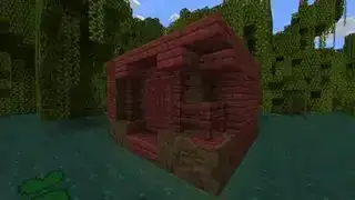 Minecraft: una casa de madera de manglar construida en un pantano de manglares.