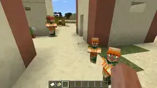 Penduduk kampung Minecraft - Dua bayi penduduk kampung berdiri di luar rumah di kampung padang pasir.